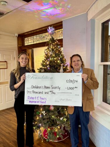 Fouss fund delivers new shoes for Christmas